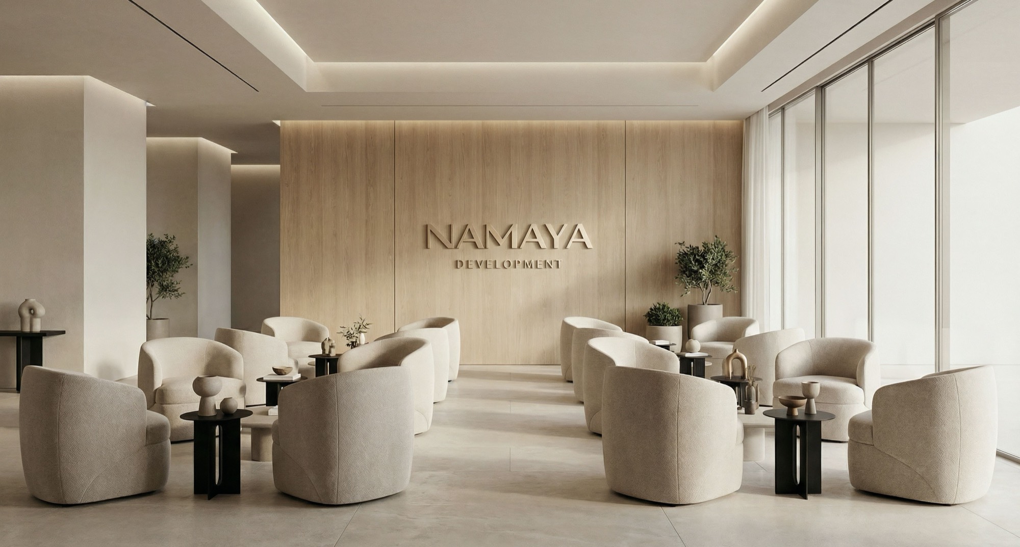 Calm Namaya reception lobby with warm wood paneling, soft seating, and the Namaya wordmark